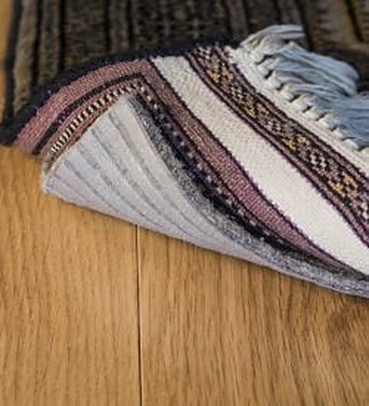 Hardwood floor protected by an Eco rug pad